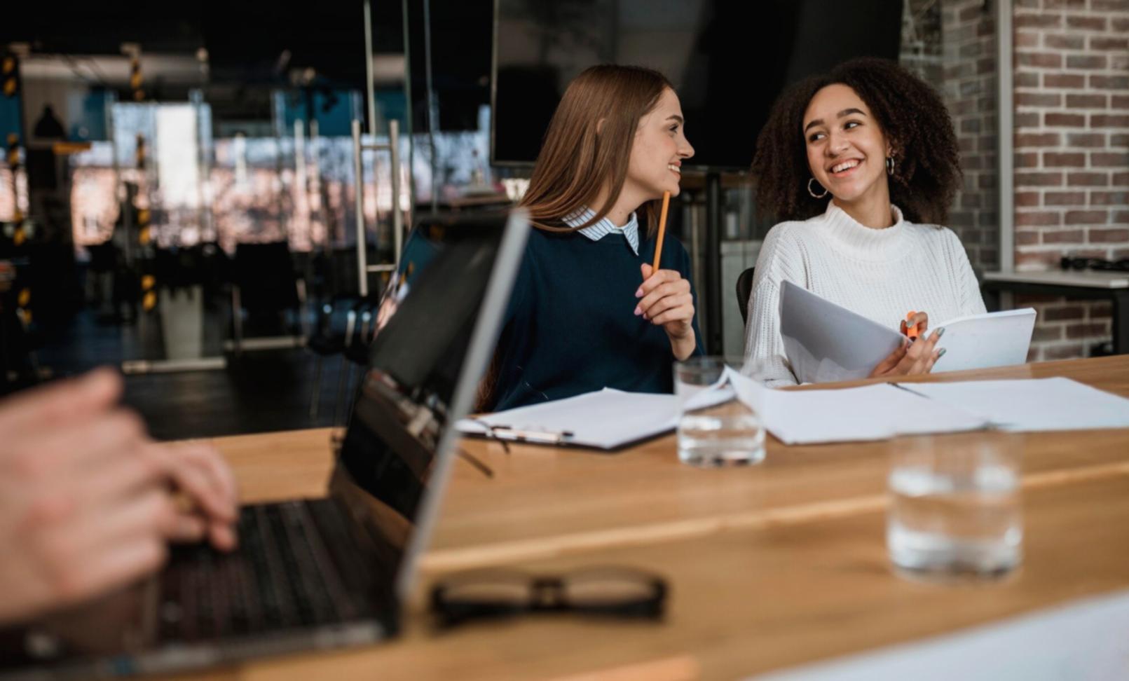 Designer workspace with sketches and digital tools